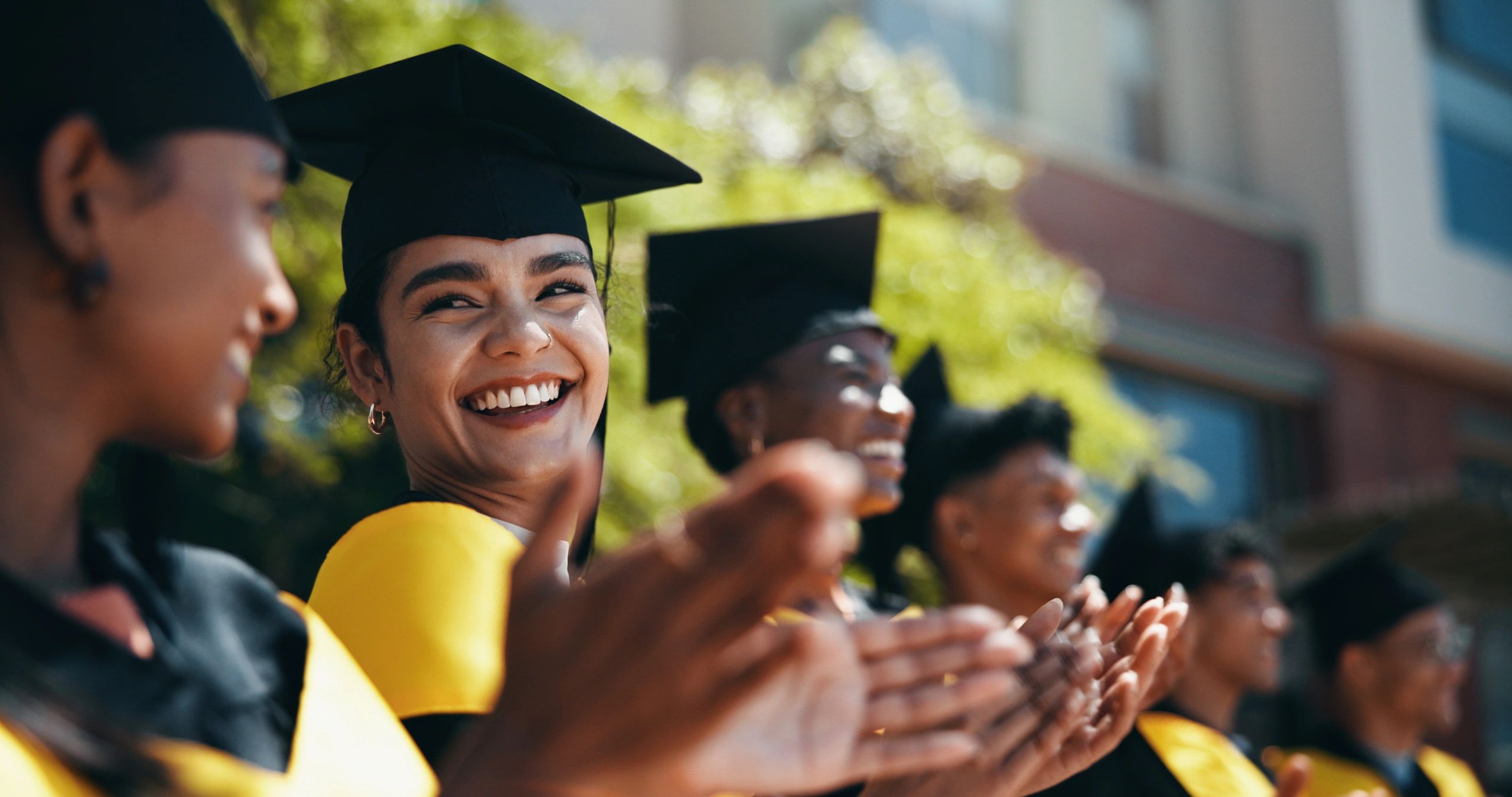 university campus students hats academic group