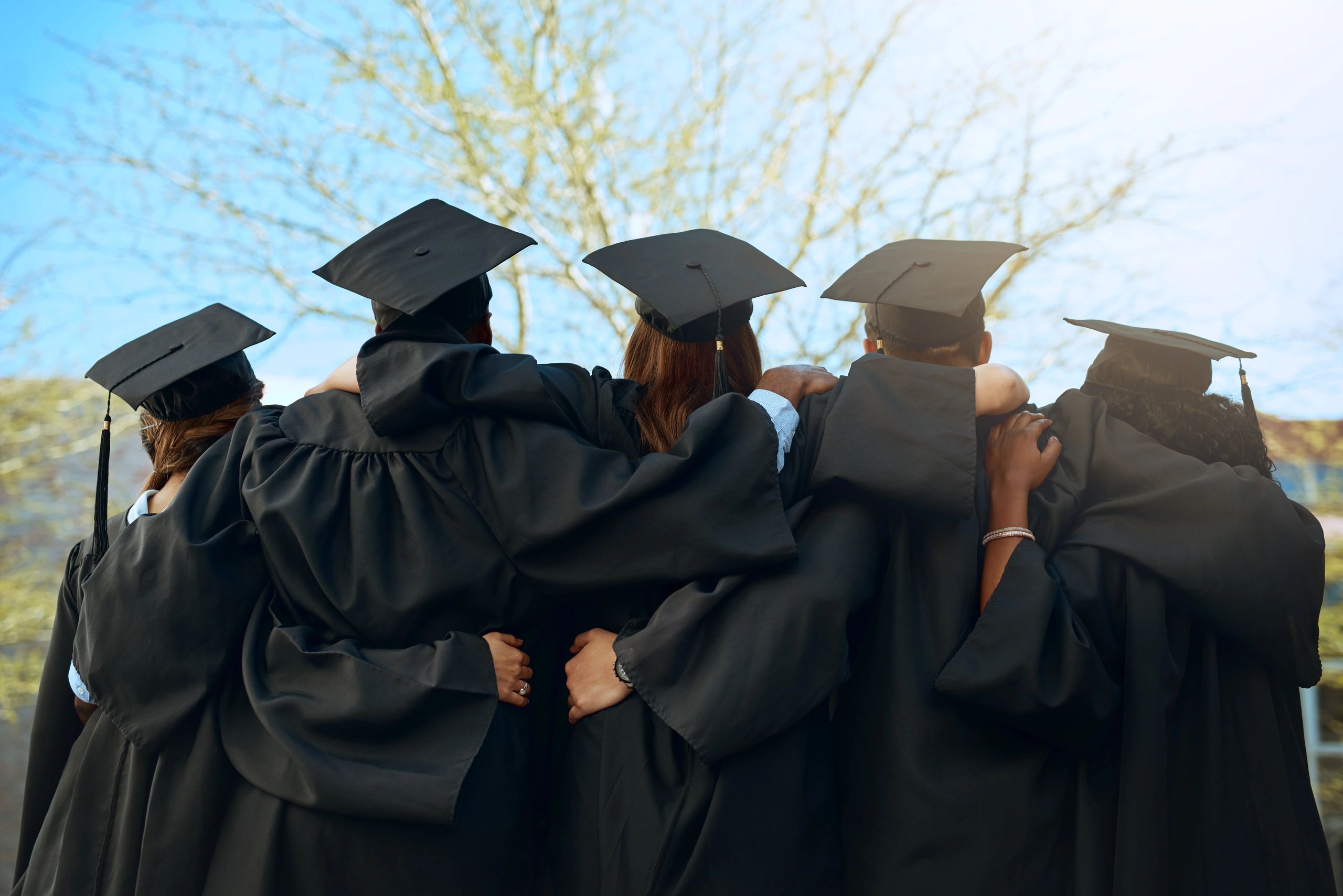 university campus students hats academic group